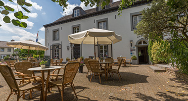 Sfeervolle loungeruimte van Fletcher Hotel-Restaurant De Burghoeve